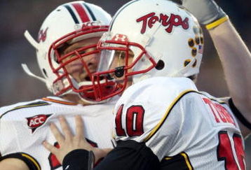 CHESTNUT HILL, MA - NOVEMBER 29:  Chris Turner #10 of the Maryland Terrapins celebrates his touchdown with teammate Cory Jackson #38 in the first quarter against the Boston College Eagles on November 29, 2008 at Alumni Stadium in Chestnut Hill, Massachusetts.  (Photo by Elsa/Getty Images)