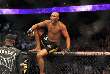 PHILADELPHIA - AUGUST 08:  Anderson Silva celebrates after defeating Forrest Griffin during their light heavyweight bout at UFC 101: Declaration at the Wachovia Center on August 8, 2009 in Philadelphia, Pennsylvania.  (Photo by Jon Kopaloff/Getty Images)