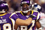 MINNEAPOLIS - DECEMBER 28:   Bernard Berrian #87 of the Minnesota Vikings celebrates his touchdown with Bobby Wade #19 in the fourth quarter against the New York Giants on December 28,2008 at the Hubert H. Humphrey Metrodome in Minneapolis, Minnesota. The Vikings defeated the Giants 20-19.  (Photo by Elsa/Getty Images)