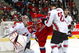 VANCOUVER - JANUARY 5: Cam Barker #25 of Team Canada checks Sergei Shirokov #29 of Team Russia as goaltender Justin Pogge #33 gets into position during their gold medal game at the World Junior Hockey Championships at General Motors Place in Vancouver, Canada. Team Canada beat Team Russia 5-0 to win the gold medal. (Photo by Dave Sandford/Getty Images)