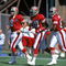 SAN FRANCISCO - SEPTEMBER 24:  (L-R) Quarterback Steve Young #8, wide receivers Jerry Rice #80 and Nate Singleton #88 of the San Francisco 49ers run on the field during a game against the New Orleans Saints at Candlestick Park on September 24, 1994 in San Francisco, California.  The 49ers won 24-13.  (Photo by George Rose/Getty Images)