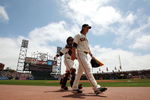 SAN FRANCISCO - JUNE 17:  Tim Lincecum #55 and Bengie Molina #1 of the San Francisco Giants walk in from the bullpen before the start of a game against the Los Angeles Angels of Anaheim at AT&T Park on June 17, 2009 in San Francisco, California.  (Photo by Ezra Shaw/Getty Images)