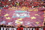 SINGAPORE - JULY 26:  SINGAPORE- JULY 26:  Liverpool's fans cheer before the pre-season friendly soccer match between Singapore and Liverpool at the National Stadium, July 26, 2009 in Singapore.  (Photo by Victor Fraile/Getty Images)