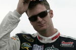 WATKINS GLEN, NY - AUGUST 09:  Dale Earnhardt Jr., driver of the #88 National Guard/AMP Energy Chevrolet, stands on the grid prior to the NASCAR Sprint Cup Series Heluva Good! Sour Cream Dips at Watkins Glen International on August 9, 2009 in Watkins Glen, New York.  (Photo by Todd Warshaw/Getty Images for NASCAR)