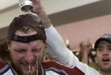 9 Jun 2001: Shjon Podein of the Colorado Avalanche is doused with beer in the locker room after defeating the New Jersey Devils to win the Stanley Cup finals at the Pepsi Center in Denver, Colorado. The Avalanche defeated the Devils 3-1 to win the series 4-3. DIGITAL IMAGE Mandatory Credit: Brian Bahr/ALLSPORT