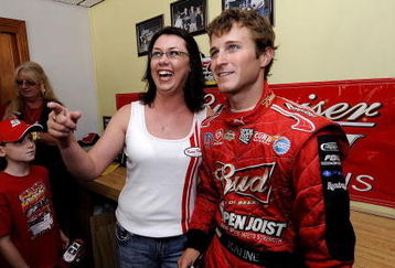 OSWEGO, NY - AUGUST 06:  NASCAR driver Kasey Kahne pose for photos with fans before the Kasey Kahne Steel Palace Classic at the Oswego Speedway on August 6, 2009 in Oswego, New York.  (Photo by Jeff Zelevansky/Getty Images)