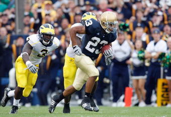 SOUTH BEND,IN - SEPTEMBER 13:  Golden Tate #23 of the Notre Dame Fighting Irish carries the ball during the game against the Michigan Wolverines on September 13, 2008 at Notre Dame Stadium in South Bend, Indiana. (Photo by: Gregory Shamus/Getty Images)