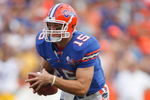 GAINESVILLE, FL - OCTOBER 7:  Quarterback Tim Tebow #15 of the Florida Gators runs with the ball during the game against the LSU Tigers at Ben Hill Griffin Stadium on October 7, 2006 in Gainesville, Florida. Florida won 23-10.  (Photo by Marc Serota/Getty Images)