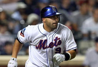 NEW YORK - JUNE 28:  Omir Santos #9 of the New York Mets bats against the New York Yankees on June 28, 2009 at Citi Field in the Flushing neighborhood of the Queens borough of New York City.  (Photo by Jim McIsaac/Getty Images)