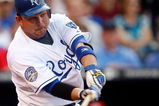KANSAS CITY, MO - JUNE 12:  Billy Butler #16 of the Kansas City Royals hits a home run during the 1st inning of the game against the Cincinnati Reds on June 12, 2009 at Kauffman Stadium in Kansas City, Missouri.  (Photo by Jamie Squire/Getty Images)