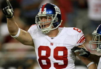 GLENDALE, AZ - NOVEMBER 23: Tight end Kevin Boss #89 of the New York Giants celebrates after scoring on a ten yard touchdown pass play against the Arizona Cardinals on November 23, 2008 at University of Phoenix Stadium in Glendale, Arizona. The Giants won 37-29.  (Photo by Stephen Dunn/Getty Images)