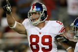 GLENDALE, AZ - NOVEMBER 23: Tight end Kevin Boss #89 of the New York Giants celebrates after scoring on a ten yard touchdown pass play against the Arizona Cardinals on November 23, 2008 at University of Phoenix Stadium in Glendale, Arizona. The Giants won 37-29.  (Photo by Stephen Dunn/Getty Images)