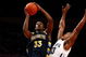 NEW YORK - MARCH 12:  Dante Cunningham #33 of the Villanova Wildcats goes to the hoop against Jimmy Butler #33 of the Marquette Golden Eagles during the second round of the Big East Tournament at Madison Square Garden on March 12, 2009 in New York City.  (Photo by Chris McGrath/Getty Images)