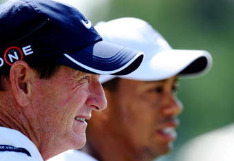 CHASKA, MN - AUGUST 12:  (L-R) Swing coach Hank Haney and Tiger Woods look on during the third preview day of the 91st PGA Championship at Hazeltine National Golf Club on August 12, 2009 in Chaska, Minnesota.  (Photo by Stuart Franklin/Getty Images)