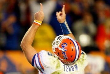 MIAMI - JANUARY 08:  Tim Tebow #15 of the Florida Gators celebrates after he threw a 4-yard touchdown to David Nelson #83 in the fourth quarter against the Oklahoma Sooners during the FedEx BCS National Championship game at Dolphin Stadium on January 8, 2009 in Miami, Florida. FLorida won 24-17. (Photo by Marc Serota/Getty Images)