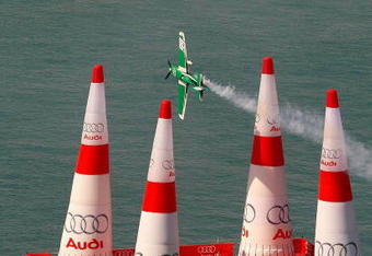 DETROIT - JUNE 12:  Michael Goulian flies through a gate during a practice session for the 2009 Windsor, Ontario Red Bull Air Race on June 12, 2009 at the Detroit River in Detroit, Michigan.  (Photo by Kevin C. Cox/Getty Images)
