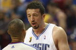ORLANDO, FL - JUNE 14:  Hedo Turkoglu #15 of the Orlando Magic talks with referee Dan Crawford #43 during Game Five of the 2009 NBA Finals against the Los Angeles Lakers on June 14, 2009 at Amway Arena in Orlando, Florida. The Lakers won 99-86. NOTE TO USER:  User expressly acknowledges and agrees that, by downloading and or using this photograph, User is consenting to the terms and conditions of the Getty Images License Agreement. (Photo by Elsa/Getty Images) 