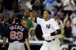 NEW YORK - AUGUST 07:  Alex Rodriguez #13 of the New York Yankees celebrates a walk off home run in the 15th inning as losing pitcher Junichi Tazawa #63 of the Boston Red Sox walks off the field on August 7, 2009 at Yankee Stadium in the Bronx borough of New York City.  The New York Yankees defeated the Boston Red Sox 2-0.  (Photo by Jeff Zelevansky/Getty Images)