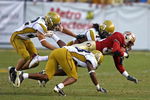 ATLANTA - NOVEMBER 1:  Members of the Georgia Tech Yellow Jackets defense, including safety Morgan Burnett #1, swarm running back Jermaine Thomas #38 of the Florida State Seminoles during the game at Bobby Dodd Stadium at Historic Grant Field on November 1, 2008 in Atlanta, Georgia.  The Yellow Jackets beat the Seminoles 31-28.  (Photo by Mike Zarrilli/Getty Images)