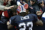 ORCHARD PARK, NY - NOVEMBER 04:  Marshawn Lynch #23 of the Buffalo Bills huddles with fans after the game against the Cincinnati Bengals on November 4, 2007 at Ralph Wilson Stadium in Orchard Park, New York. Lynch had his first 100 yard game as a professional.  (Photo by Rick Stewart/Getty Images)