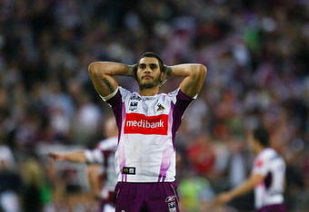 SYDNEY, AUSTRALIA - OCTOBER 05: Greg Inglis of the Storm looks dejected during the NRL Grand Final match between the Manly Warringah Sea Eagles and the Melbourne Storm at ANZ Stadium on October 5, 2008 in Sydney, Australia.  (Photo by Mark Nolan/Getty Images)