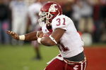 LOS ANGELES - SEPTEMBER 22: Dwight Tardy #31 of the Washington State Cougars carries the ball during the game against the USC Trojans on September 22, 2007 at the Los Angeles Coliseum in Los Angeles, California.  (Photo by Stephen Dunn/Getty Images)