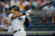 NEW YORK - AUGUST 10: Derek Jeter #2 of the New York Yankees hits a home run in the first inning during the game on August 10, 2009 at Yankee Stadium in the Bronx Borough of New York City. (Photo by Jared Wickerham/Getty Images)