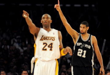 LOS ANGELES, CA - JANUARY 25:  Tim Duncan #21 of the San Antonio Spurs reacts to a foul next to Kobe Bryant #24 of the Los Angeles Lakers during the forth quarter at the Staples Center on January 25, 2009 in Los Angeles, California.  The Lakers defeated the Spurs 99-85.  NOTE TO USER:  User expressly acknowledges and agrees that, by downloading and/or using this photograph, User is consenting to the terms and conditions of the Getty Images License Agreement.  (Photo by Harry How/Getty Images)