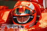 BARCELONA, SPAIN - FEBRUARY 25:  Michael Schumacher of Germany and Ferrari looks on from the pits during day one of the Formula One Testing at the Circuit de Catalunya on February 25, 2008 in Barcelona, Spain.  (Photo by Ryan Pierse/Getty Images)