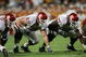 MIAMI - JANUARY 4:  Offensive linemen Wes Sims #60 and Davin Joseph #77 of the Oklahoma Sooners line up against the USC Trojans in the 2005 FedEx Orange Bowl National Championship on January 4, 2005 at Pro Player Stadium in Miami, Florida. USC defeated Oklahoma 55-19. (Photo by Brian Bahr/Getty Images)