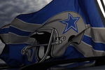 IRVING, TX - DECEMBER 20:  Dallas Cowboys flags fly outside Texas Stadium before the last home game against the Baltimore Ravens on December 20, 2008 in Irving, Texas. The Cowboys are playing their final regular season home game before moving to a new stadium in Arlington, Texas next season.  (Photo by Ronald Martinez/Getty Images)
