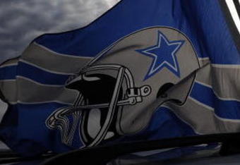 IRVING, TX - DECEMBER 20:  Dallas Cowboys flags fly outside Texas Stadium before the last home game against the Baltimore Ravens on December 20, 2008 in Irving, Texas. The Cowboys are playing their final regular season home game before moving to a new stadium in Arlington, Texas next season.  (Photo by Ronald Martinez/Getty Images)
