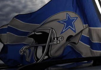 IRVING, TX - DECEMBER 20:  Dallas Cowboys flags fly outside Texas Stadium before the last home game against the Baltimore Ravens on December 20, 2008 in Irving, Texas. The Cowboys are playing their final regular season home game before moving to a new stadium in Arlington, Texas next season.  (Photo by Ronald Martinez/Getty Images)