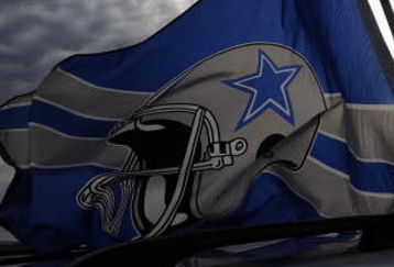 IRVING, TX - DECEMBER 20:  Dallas Cowboys flags fly outside Texas Stadium before the last home game against the Baltimore Ravens on December 20, 2008 in Irving, Texas. The Cowboys are playing their final regular season home game before moving to a new stadium in Arlington, Texas next season.  (Photo by Ronald Martinez/Getty Images)