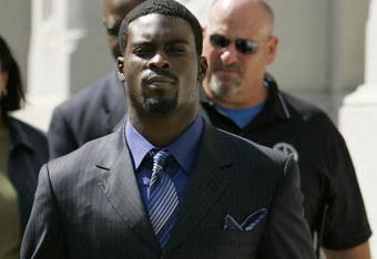 RICHMOND, VA - JULY 26:   Atlanta Falcons quarterback Michael Vick leaves the federal courthouse following his arraignment on July 26, 2007 in Richmond, Virginia. Vick pleaded not guilty Thursday to federal dogfighting charges and was released without bond until a November 26 trial.  (Photo by Haraz N. Ghanbari-Pool/Getty Images)