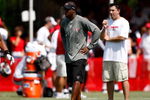 TAMPA, FL - AUGUST 01:  Head coach Raheem Morris of the Tampa Bay Buccaneers watches his team during Training Camp at One Buccaneer Place on August 1, 2009 in Tampa, Florida.  (Photo by J. Meric/Getty Images)