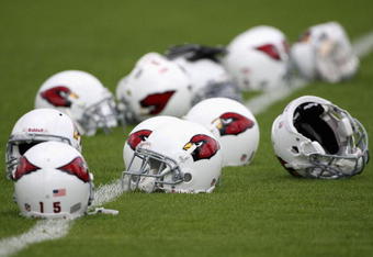 FLAGSTAFF, AZ - JULY 31:  Arizona Cardinal's helmets sit on the field during the team training camp at Northern Arizona University on July 31, 2009 in Flagstaff, Arizona.  (Photo by Christian Petersen/Getty Images)