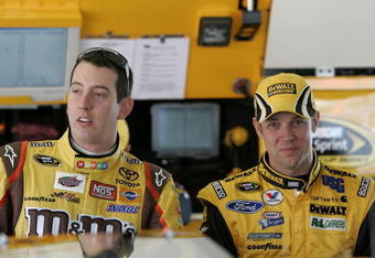DAYTONA BEACH, FL - FEBRUARY 06:  Kyle Busch driver of the #18 M&M's Toyota tals with Matt Kenseth driver of the #17 DEWALT Ford during practice for the Budweiser Shootout at Daytona International Speedway on February 6, 2008 in Daytona, Florida.  (Photo by Jerry Markland/Getty Images for NASCAR)
