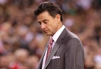 INDIANAPOLIS - MARCH 29:  Head coach Rick Pitino of the Louisville Cardinals walks with his head down against the Michigan State Spartans during the fourth round of the NCAA Division I Men's Basketball Tournament at the Lucas Oil Stadium on March 29, 2009 in Indianapolis, Indiana.  (Photo by Andy Lyons/Getty Images)