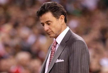 INDIANAPOLIS - MARCH 29:  Head coach Rick Pitino of the Louisville Cardinals walks with his head down against the Michigan State Spartans during the fourth round of the NCAA Division I Men's Basketball Tournament at the Lucas Oil Stadium on March 29, 2009 in Indianapolis, Indiana.  (Photo by Andy Lyons/Getty Images)