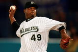 MIAMI - JUNE 22:  Pitcher Armando Benitez #49 of the Florida Marlins pitches against the Minnesota Twins during interleague play at Dolphin Stadium on June 22, 2007 in Miami, Florida. The Marlins defeated the Twins 5-4.  (Photo by Doug Benc/Getty Images)