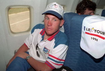 8 JUL 1994:  LANCE ARMSTRONG OF THE USA RELAXES IN HIS SEAT ON THE PLANE TAKING ALL THE RIDERS FROM PORTSMOUTH TO CHERBOURG FOR THE START OF STAGE 6. Mandatory Credit: Pascal Rondeau/ALLSPORT