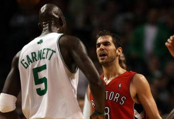 BOSTON - NOVEMBER 10:  Jose Calderon #8 of the Toronto Raptors and Kevin Garnett #5 of the Boston Celtics exchange words on November 10,  2008 at TD Banknorth Garden in Boston, Massachusetts. The Celtics defeated the Toronto Raptors 94-87.  NOTE TO USER: User expressly acknowledges and agrees that, by downloading and/or using this Photograph, user is consenting to the terms and conditions of the Getty Images License Agreement.  (Photo by Elsa/Getty Images)