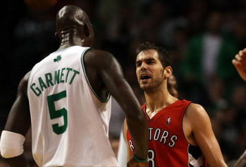 BOSTON - NOVEMBER 10:  Jose Calderon #8 of the Toronto Raptors and Kevin Garnett #5 of the Boston Celtics exchange words on November 10,  2008 at TD Banknorth Garden in Boston, Massachusetts. The Celtics defeated the Toronto Raptors 94-87.  NOTE TO USER: User expressly acknowledges and agrees that, by downloading and/or using this Photograph, user is consenting to the terms and conditions of the Getty Images License Agreement.  (Photo by Elsa/Getty Images)