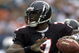 30 Dec 2001: Michael Vick # 7 of the Atlanta Falcons looks for an open man down field against the Miami Dolphins in the second quarter at Pro Player Stadium in Miami Florida. DIGITAL IMAGE. Mandatory Credit: Eliot Schechter/Getty Images