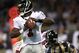 6 Jan 2002: Quarterback Michael Vick #7 of the Atlanta Falcons looks to pass against the St. Louis Rams at the Dome at America's Center in St. Louis, Missouri. DIGITAL IMAGE. Mandatory Credit: Elsa /Getty Images