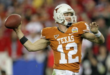 GLENDALE, AZ - JANUARY 05:  Quarterback Colt McCoy #12 of the Texas Longhorns drops back to pass during the Tostitos Fiesta Bowl Game against the Ohio State Buckeyes on January 5, 2009 at University of Phoenix Stadium in Glendale, Arizona.  (Photo by Doug Pensinger/Getty Images)