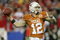 GLENDALE, AZ - JANUARY 05:  Quarterback Colt McCoy #12 of the Texas Longhorns drops back to pass during the Tostitos Fiesta Bowl Game against the Ohio State Buckeyes on January 5, 2009 at University of Phoenix Stadium in Glendale, Arizona.  (Photo by Doug Pensinger/Getty Images)