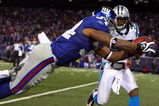 EAST RUTHERFORD, NJ - DECEMBER 21:  Running back Derrick Ward #34 of the New York Giants dives just short of the end zone in over time against the Carolina Panthers on December 21, 2008 at Giants Stadium in East Rutherford, New Jersey. The Giants defeated the Panthers 28 to 34.  (Photo by Jim McIsaac/Getty Images)