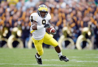 SOUTH BEND,IN - SEPTEMBER 13:  Martavious Odoms #9 of the Michigan Wolverines carries the ball during the game against the Notre Dame Fighting Irish on September 13, 2008 at Notre Dame Stadium in South Bend, Indiana. (Photo by: Gregory Shamus/Getty Images)